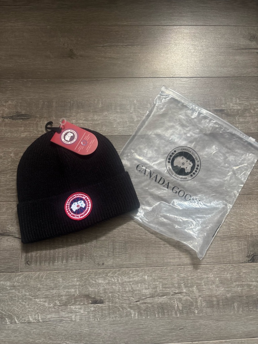 Canada Goose Black Knit Beanie with Red and White Logo Patch
